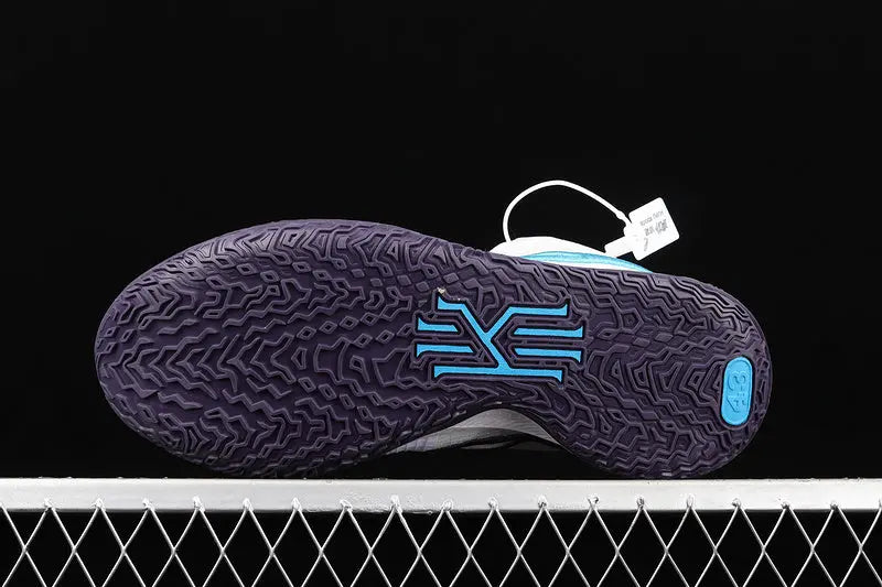 Nike Kyrie 4 Low White Laser Blue basketball shoes – low-top sneakers with crisp white and laser blue accents, Zoom Air cushioning, and court performance