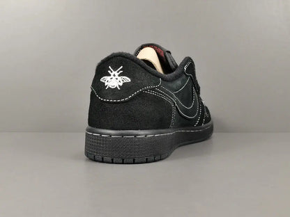 "Jordan 1 Low Travis Scott Phantom with black nubuck, white stitching, and signature reverse Swoosh."