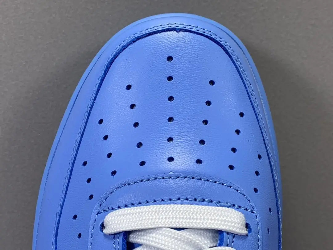 Nike Air Force 1 x Off-White MCA University Blue sneaker with metallic Swoosh
