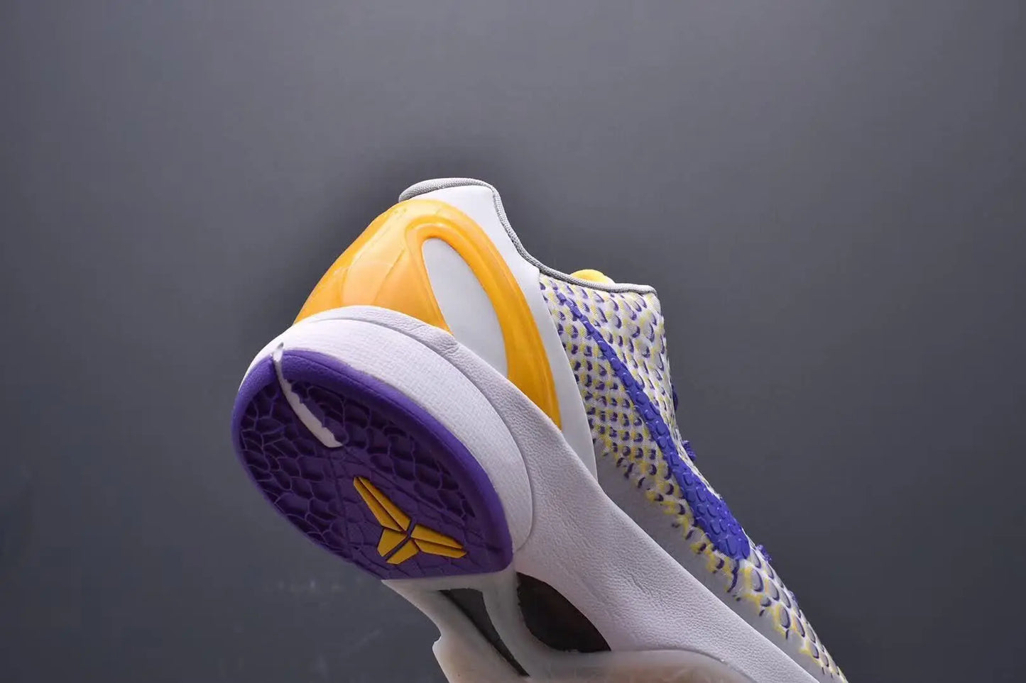 Purple and gold Kobe 6 sneakers with 3D Lakers logo design