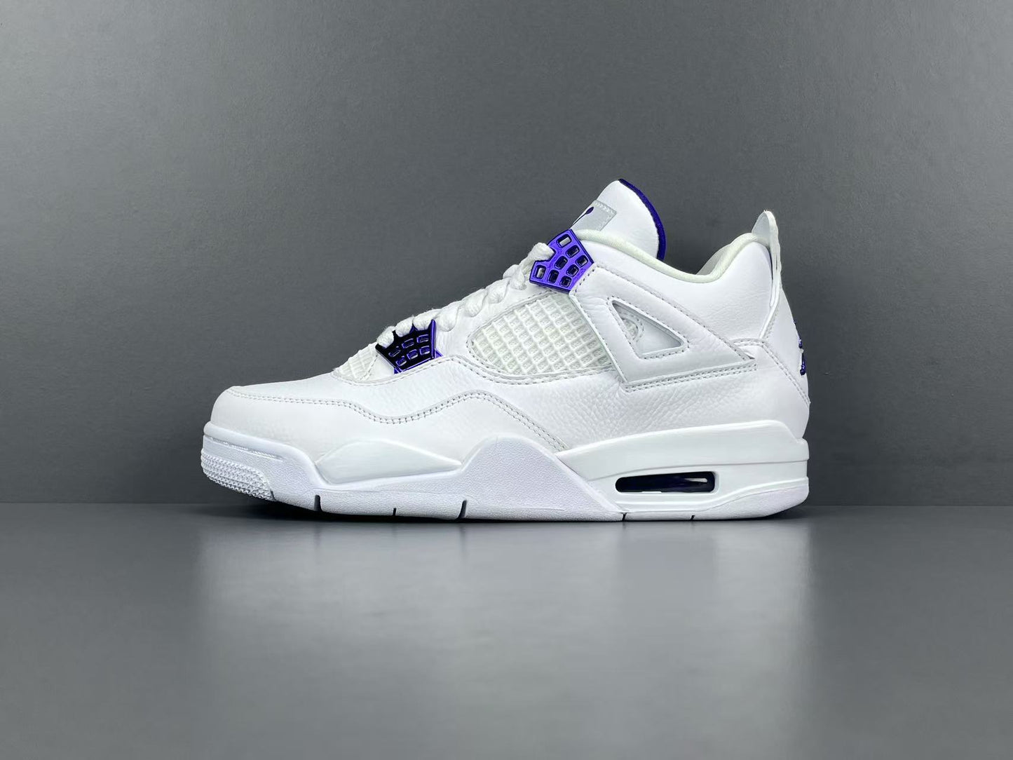 Air Jordan 4 Metallic Purple clean white sneakers with metallic purple details