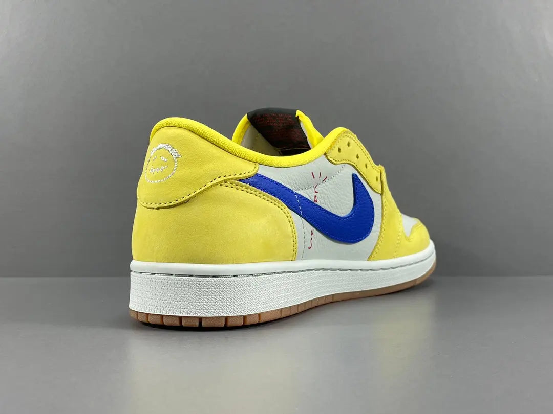"Jordan 1 Low OG x Canary – low-top sneaker with premium leather upper, bright yellow and white colorway, and classic retro design."