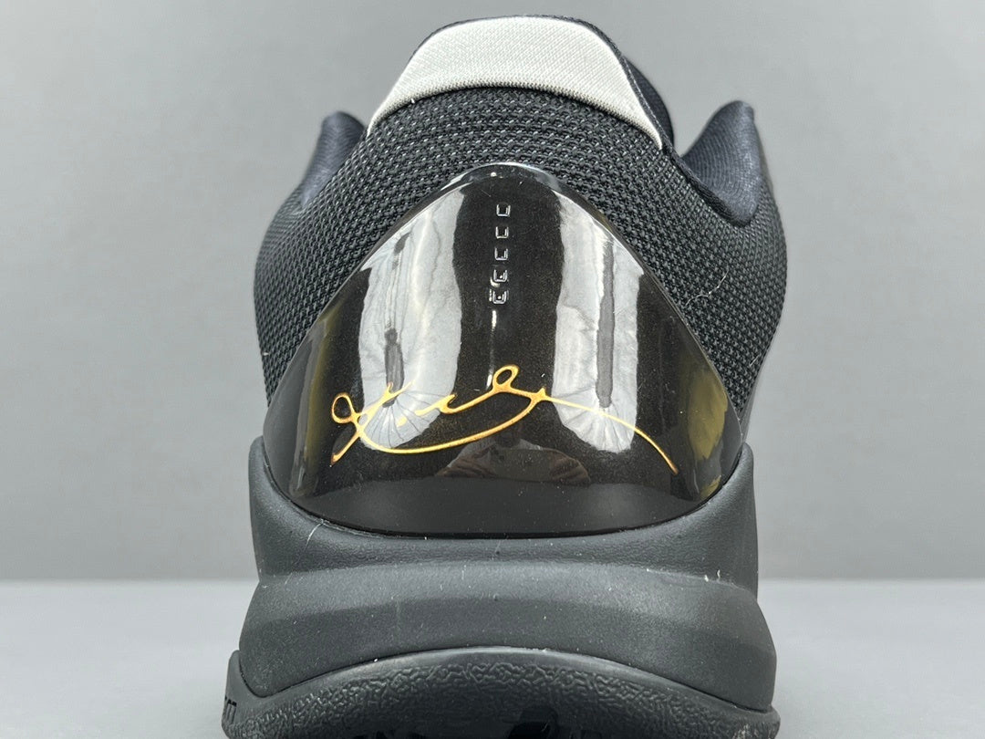 Nike Kobe 5 Blackout low-top basketball shoes in all-black stealth design colorway

