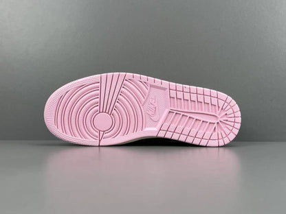 Jordan 1 Low Travis Scott Tropical Pink sneakers with reverse Swoosh
