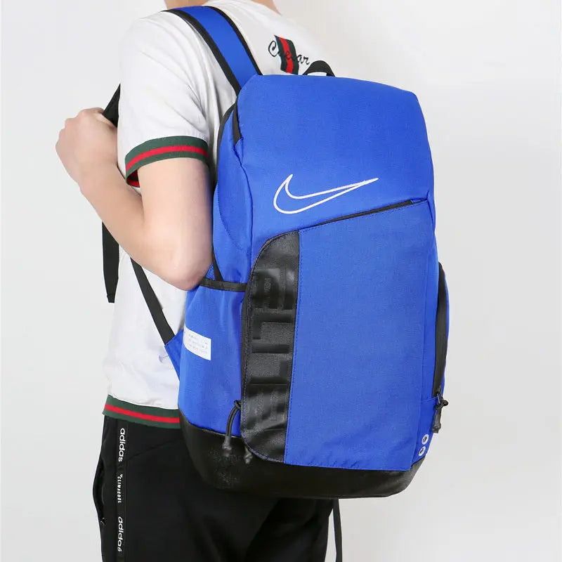 Blue and black Nike Elite Pro basketball backpack with padded straps and multiple compartments
