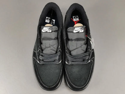 "Jordan 1 Low Travis Scott Phantom with black nubuck, white stitching, and signature reverse Swoosh."