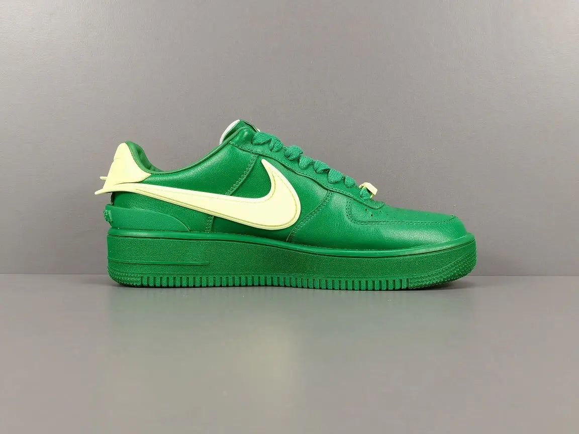 Nike Air Force 1 x AMBUSH Pine Green sneaker with oversized Swoosh design
