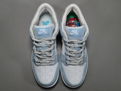 Nike SB Dunk Low Sean Cliver white gold sneaker holiday special edition red velvet lining skate shoe