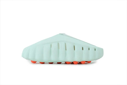 Side view of Nike Mind 001 Barley Green slides showing the thick ultra-soft foam footbed and minimalist design