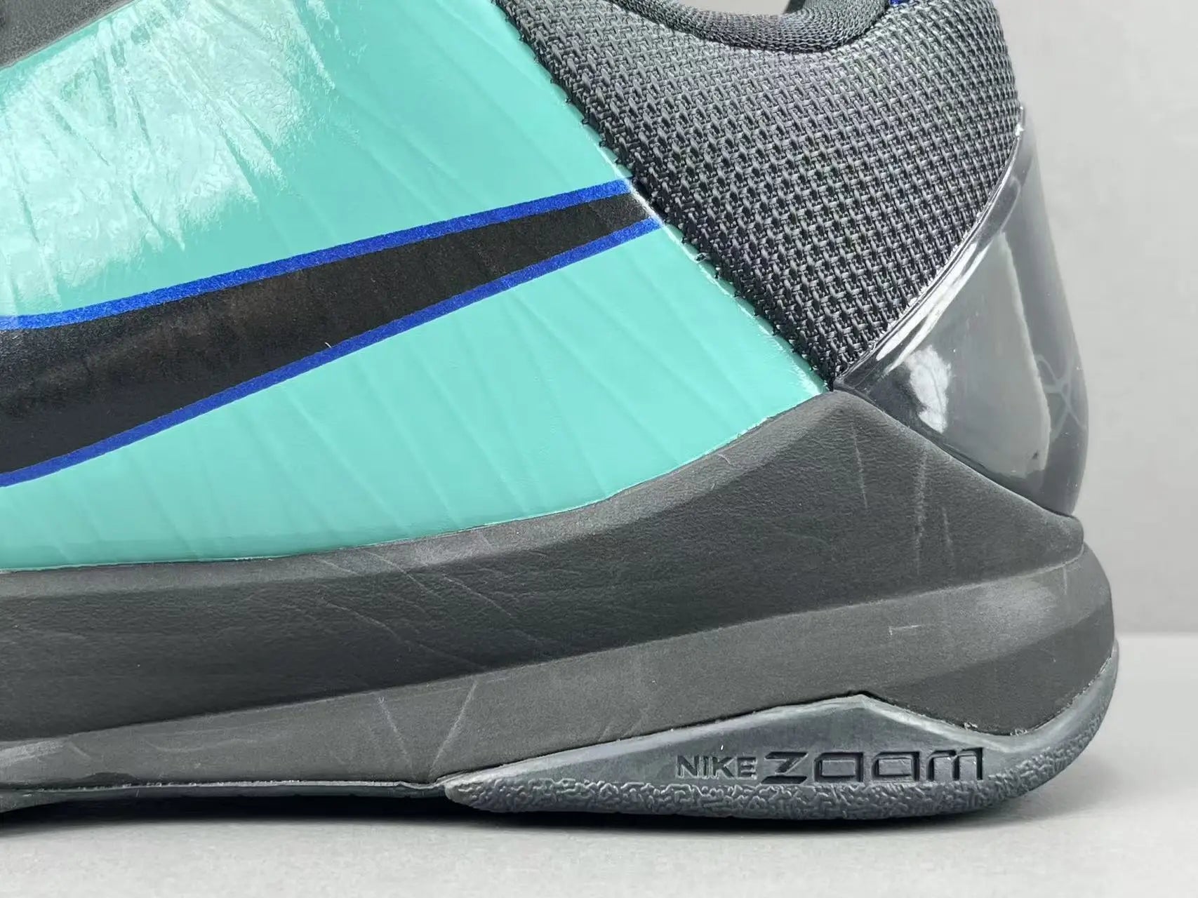Nike Kobe 5 Protro EYBL Academy PE basketball sneakers featuring lightweight upper, forefoot Zoom Air, and elite traction