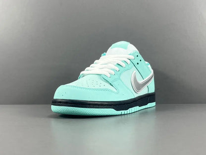 Nike SB Dunk Tiffany Lobster low top sneaker side view aqua white
