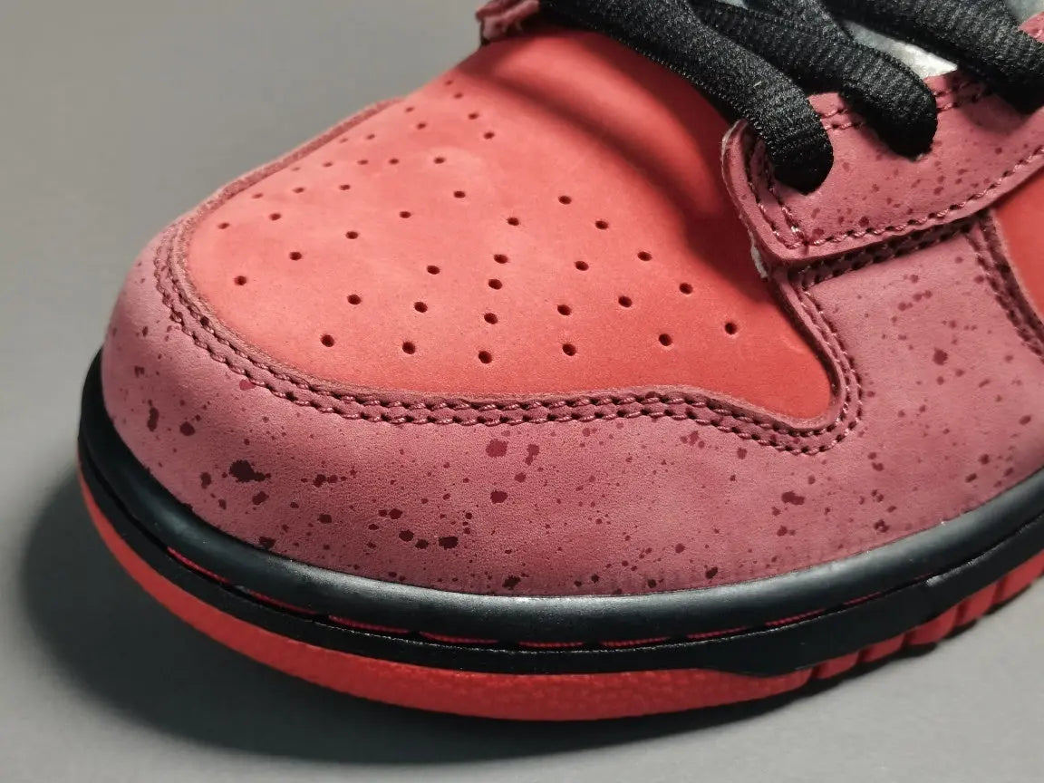 Nike SB Dunk x Concepts Red Lobster sneaker with bold red nautical details
