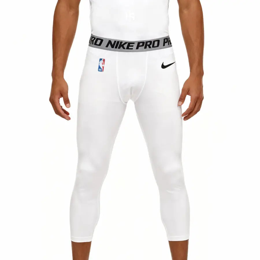 White Nike Pro leggings with a gray waistband on a white background
