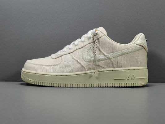 Nike Air Force 1 x Stüssy Fossil featuring textured hemp upper and minimalist branding