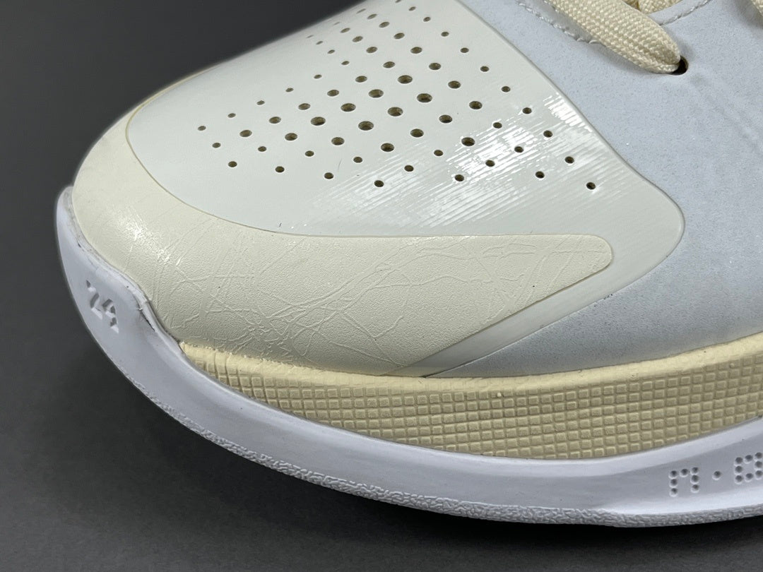 Nike Kobe 5 x Off-White collaborative basketball shoes with deconstructed design details
