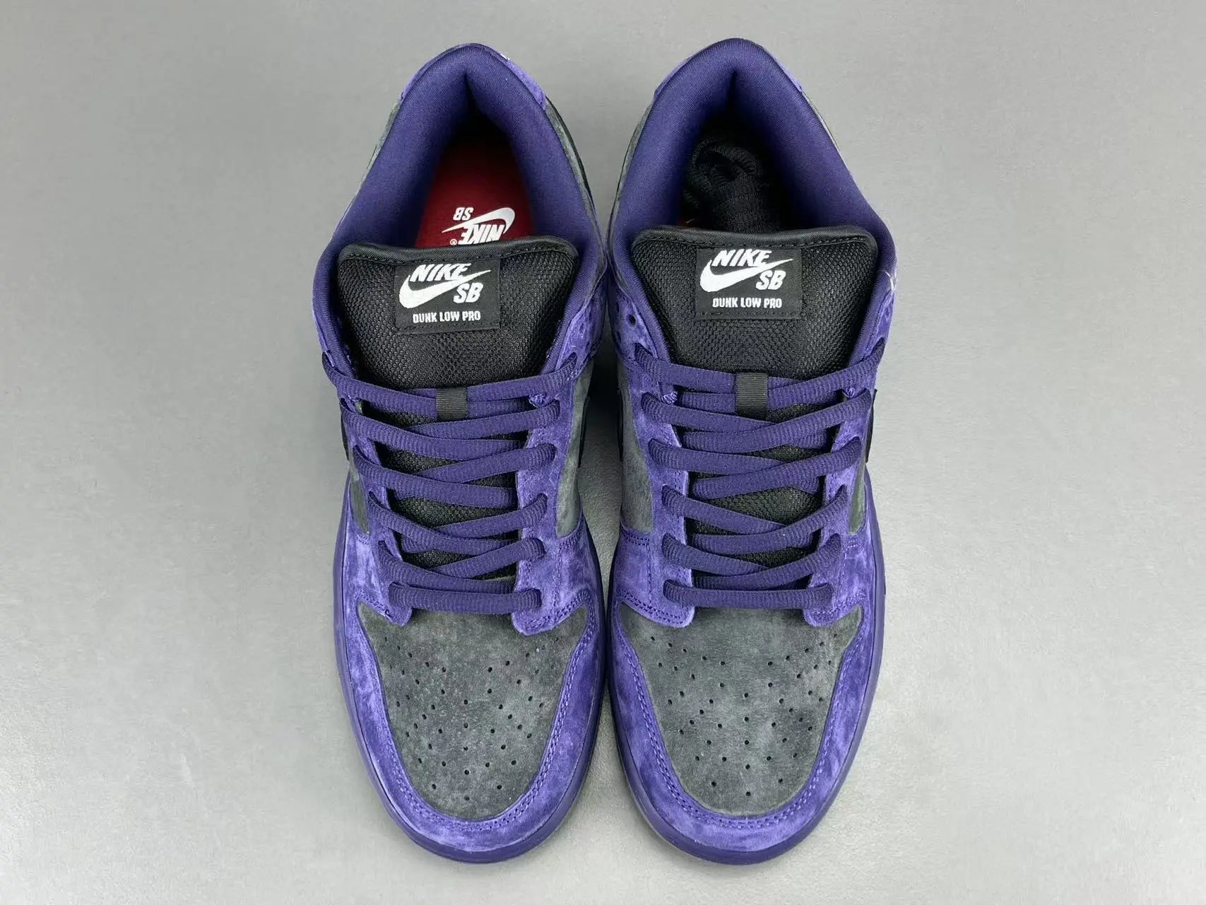 Nike SB Dunk Low x Supreme 94 Ink sneaker in deep blue leather
