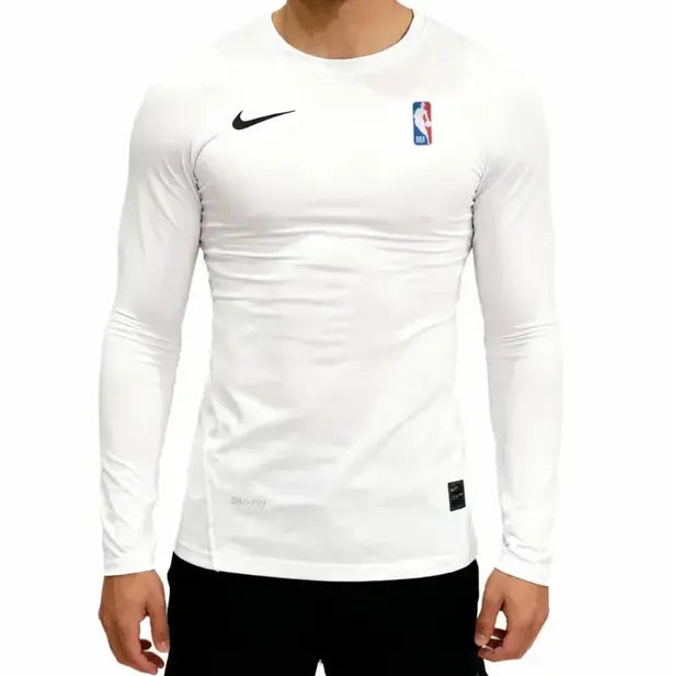 White long-sleeve athletic shirt with Nike and NBA logos on a white background