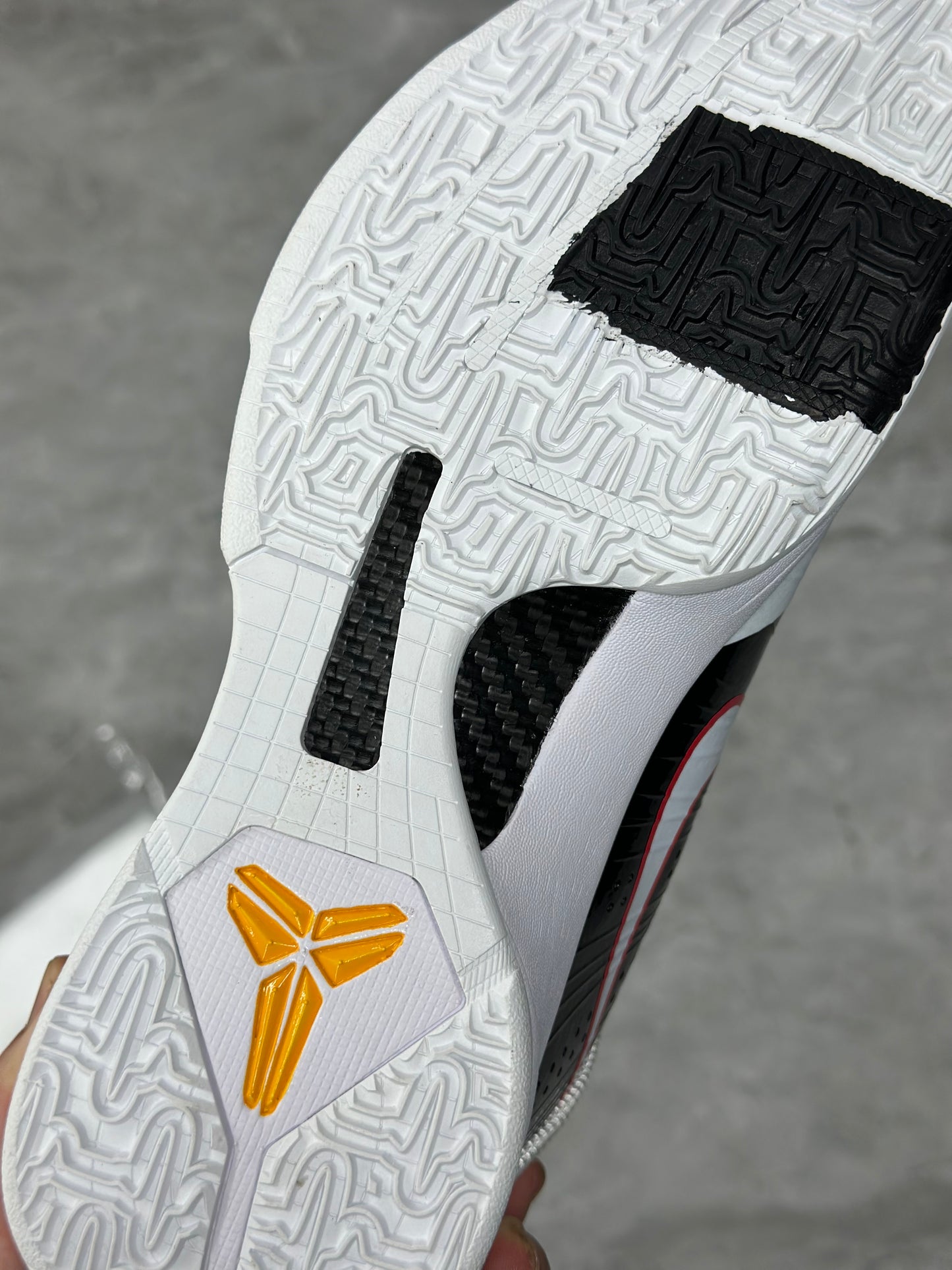 Nike Kobe 5 Protro Alternate Bruce Lee basketball shoes in yellow and black colorway
