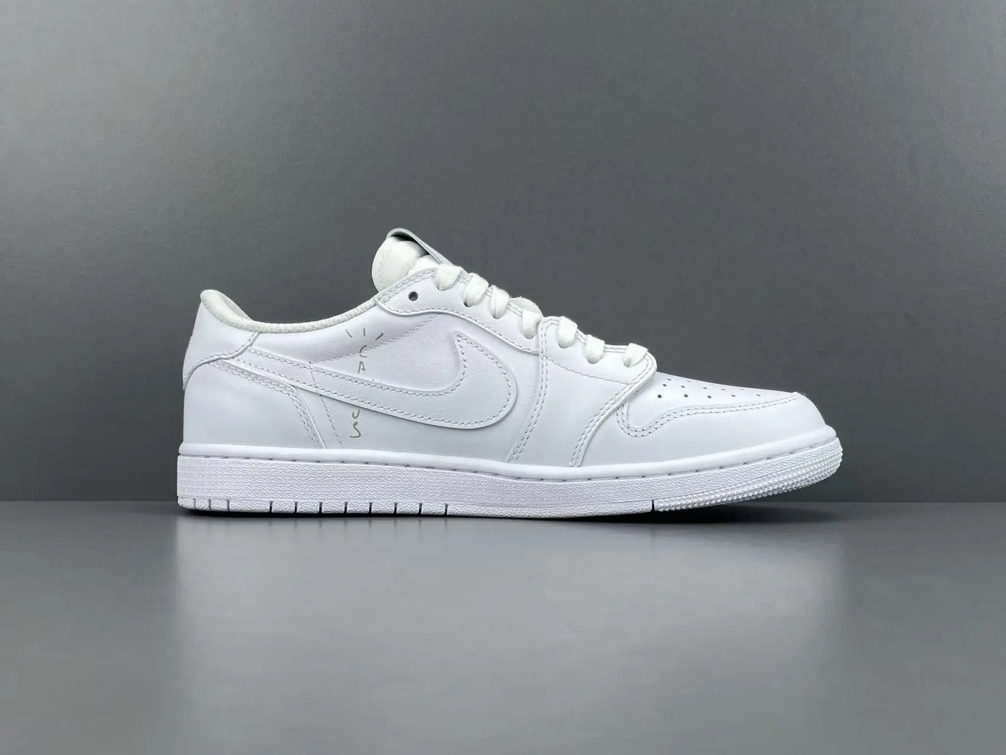Air Jordan 1 Low Travis Scott White side view reverse Swoosh leather sneaker