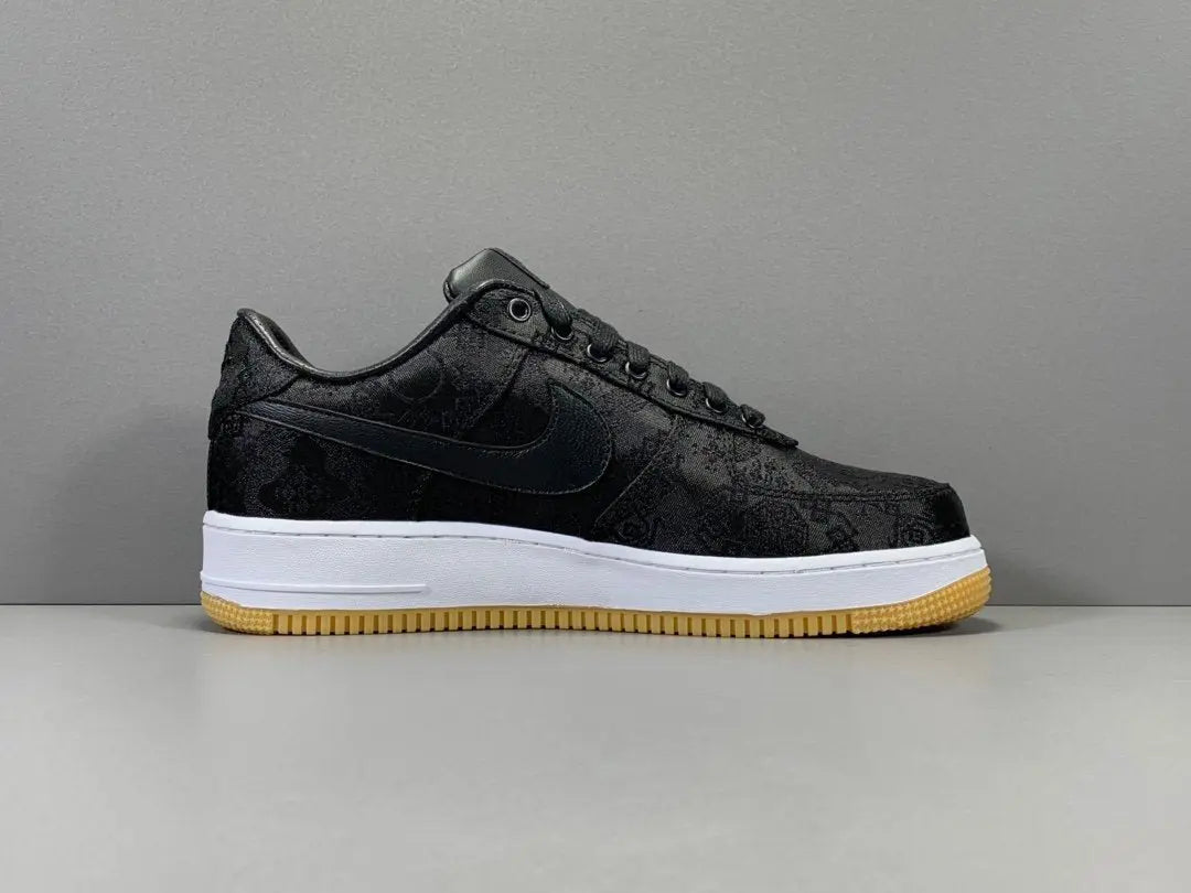 White Nike Air Force 1 x Fragment CLOT collaboration sneaker with logos
