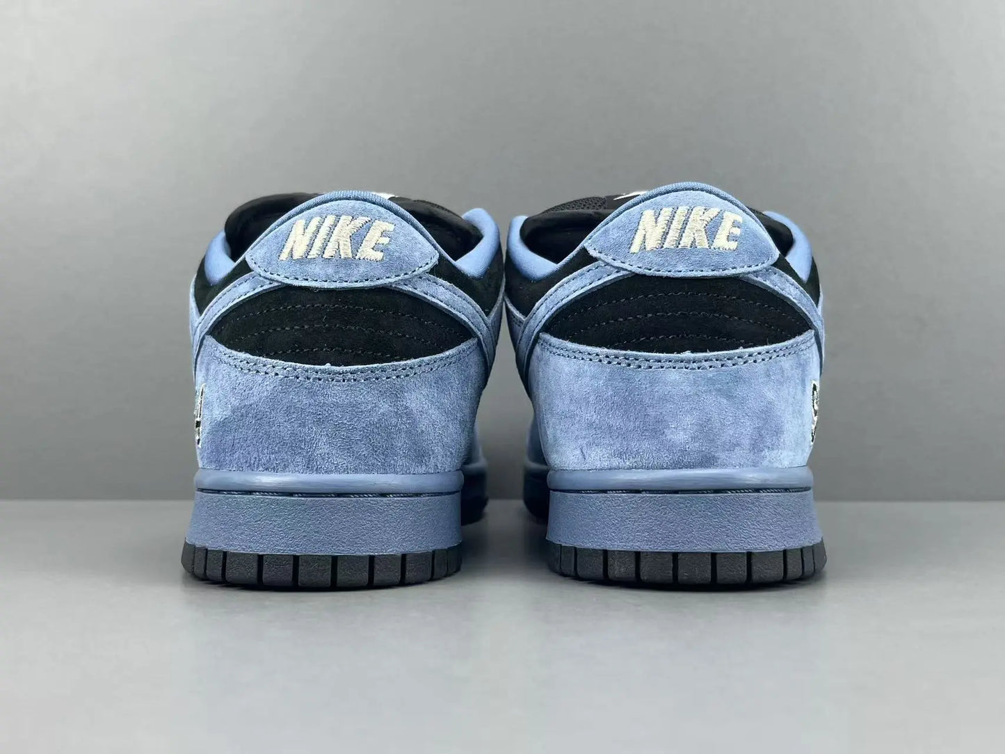 Nike SB Dunk Supreme 94 Ocean Fog low top sneaker side view grey white