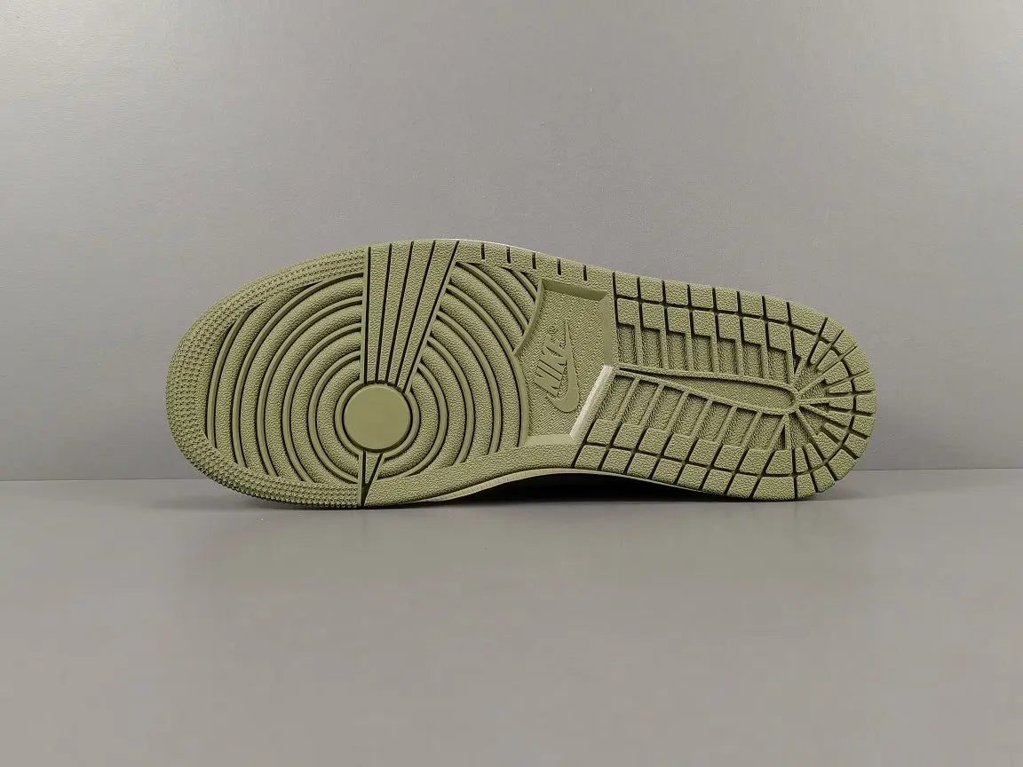"Jordan 1 Low x Travis Scott Olive with olive suede, black leather overlays, reverse Swoosh, and Cactus Jack branding."