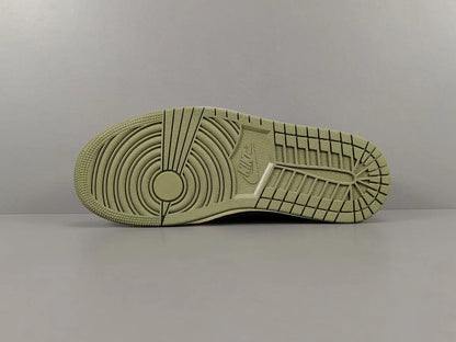 "Jordan 1 Low x Travis Scott Olive with olive suede, black leather overlays, reverse Swoosh, and Cactus Jack branding."