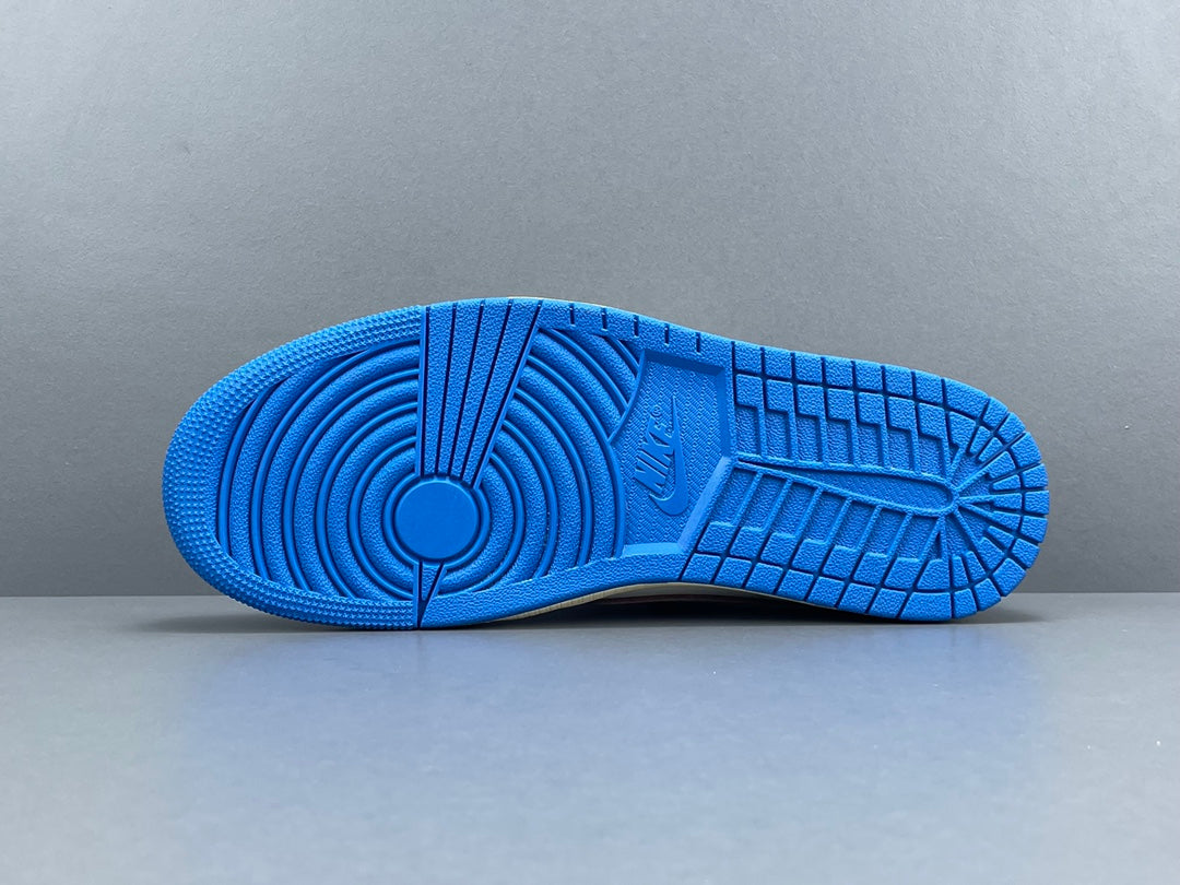 Air Jordan 1 Low OG x Travis Scott x Fragment with a white, black, and blue design, reverse Swoosh, and co-branded heel logos.