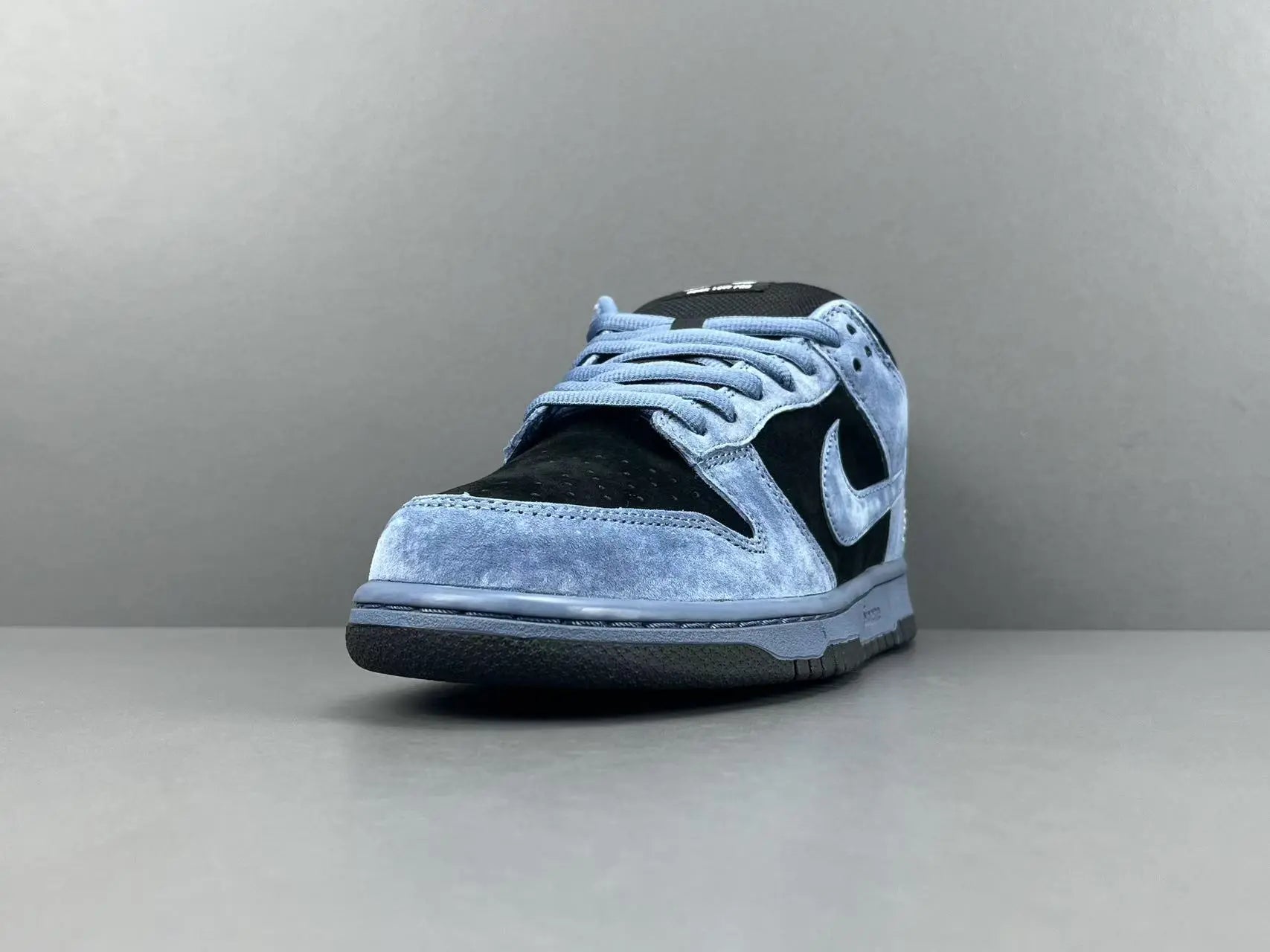 Nike SB Dunk Supreme 94 Ocean Fog low top sneaker side view grey white