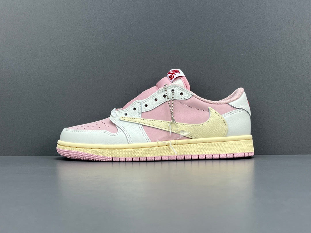 Jordan 1 Low x Travis Scott Shy Pink sneakers with reversed Swoosh design