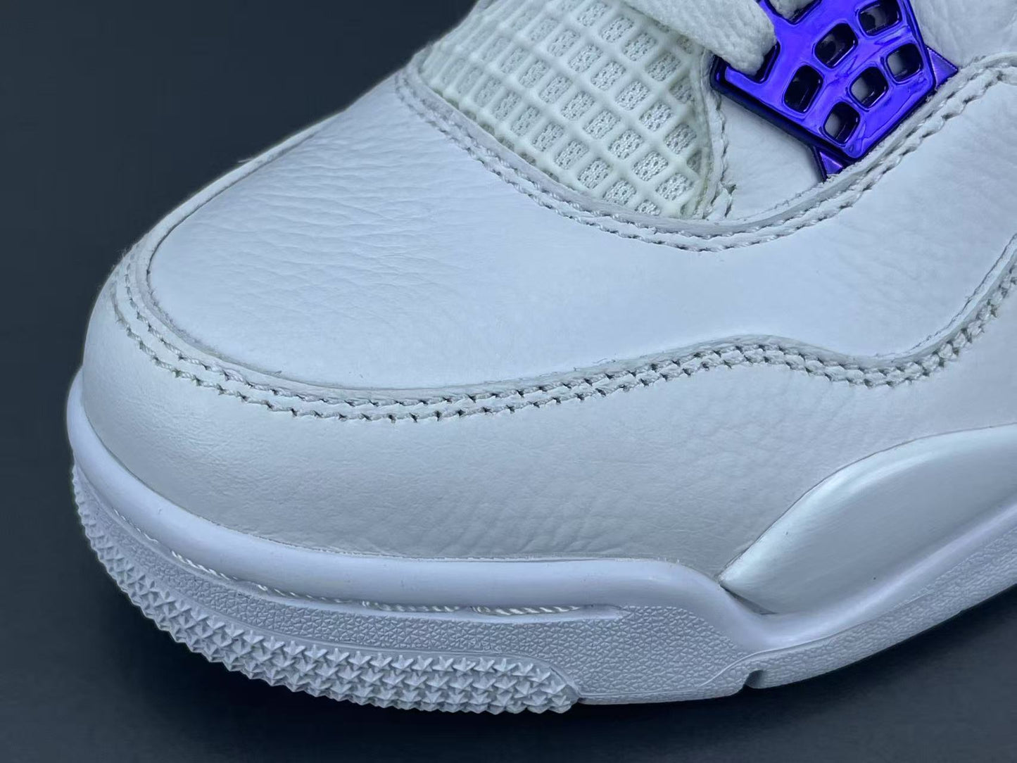 Air Jordan 4 Metallic Purple clean white sneakers with metallic purple details