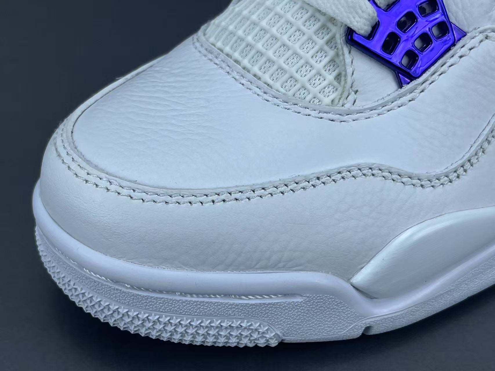 Air Jordan 4 Metallic Purple clean white sneakers with metallic purple details