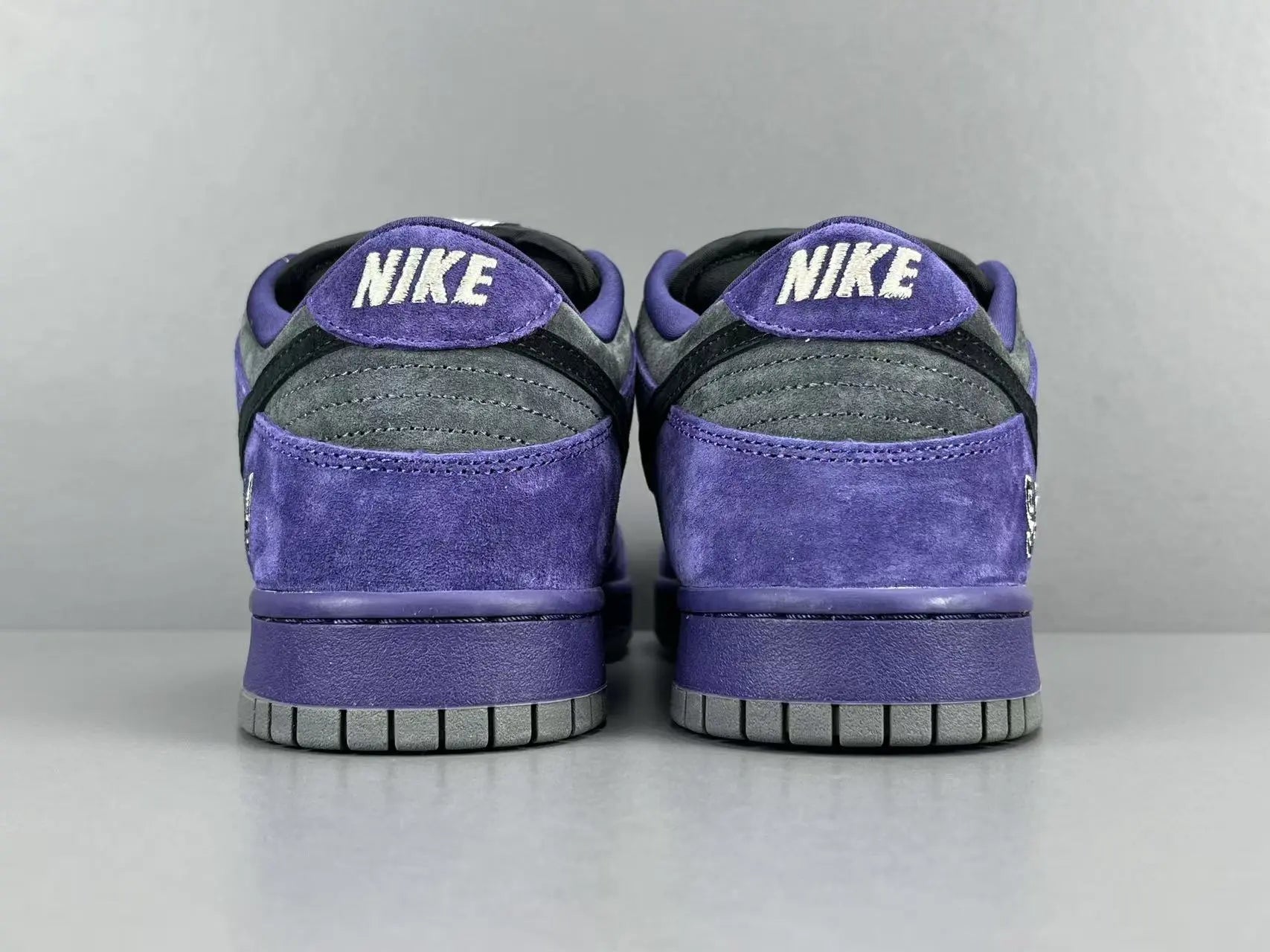 Nike SB Dunk Low x Supreme 94 Ink sneaker in deep blue leather
