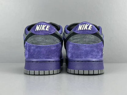 Nike SB Dunk Low x Supreme 94 Ink sneaker in deep blue leather
