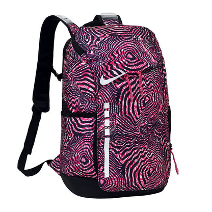 A Nike backpack featuring a vibrant pink and black wavy, psychedelic swirl pattern, with a white Nike swoosh logo on the front.