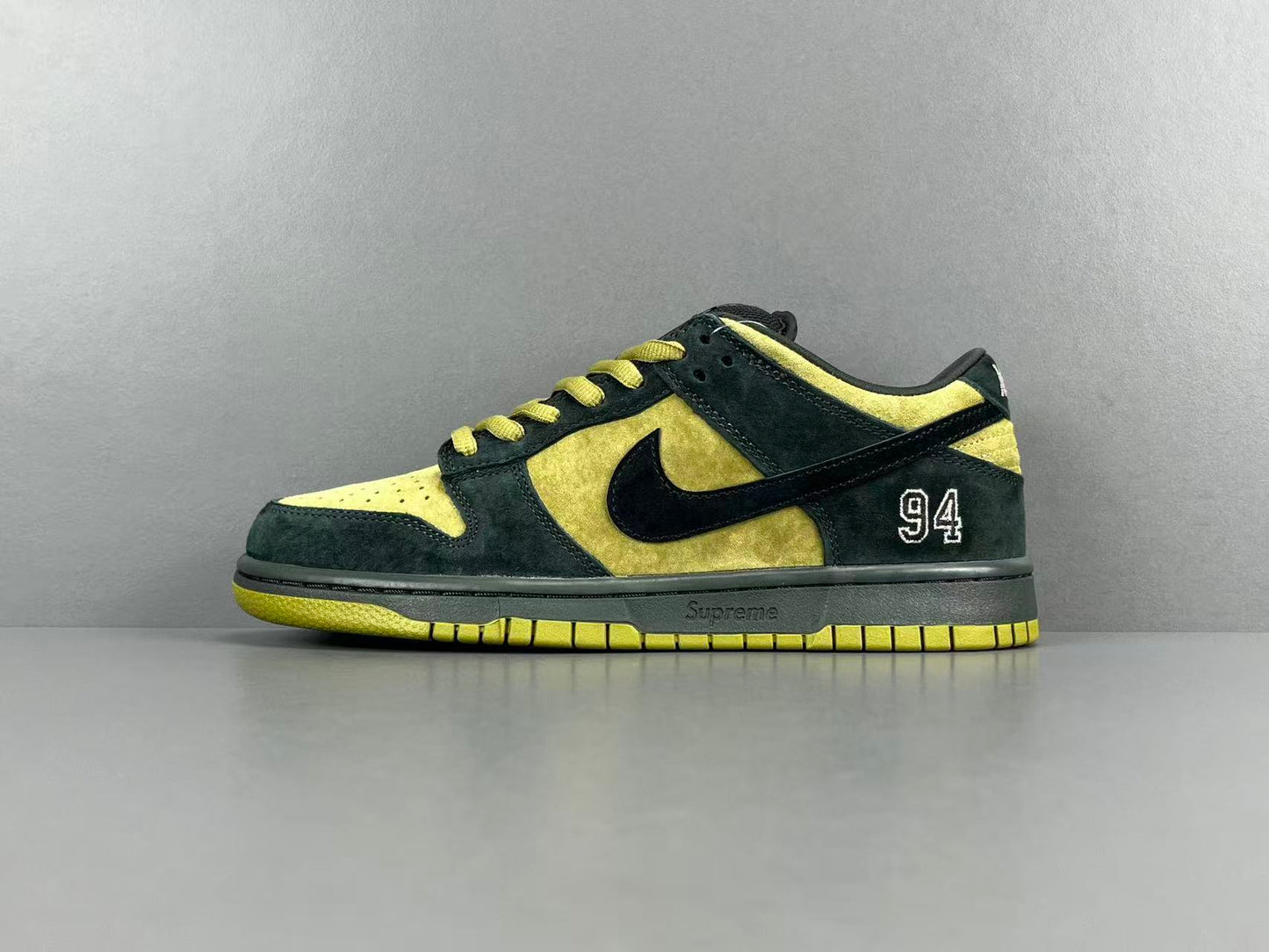 Nike SB Dunk Low x Supreme 94 Camper Green sneaker premium leather
