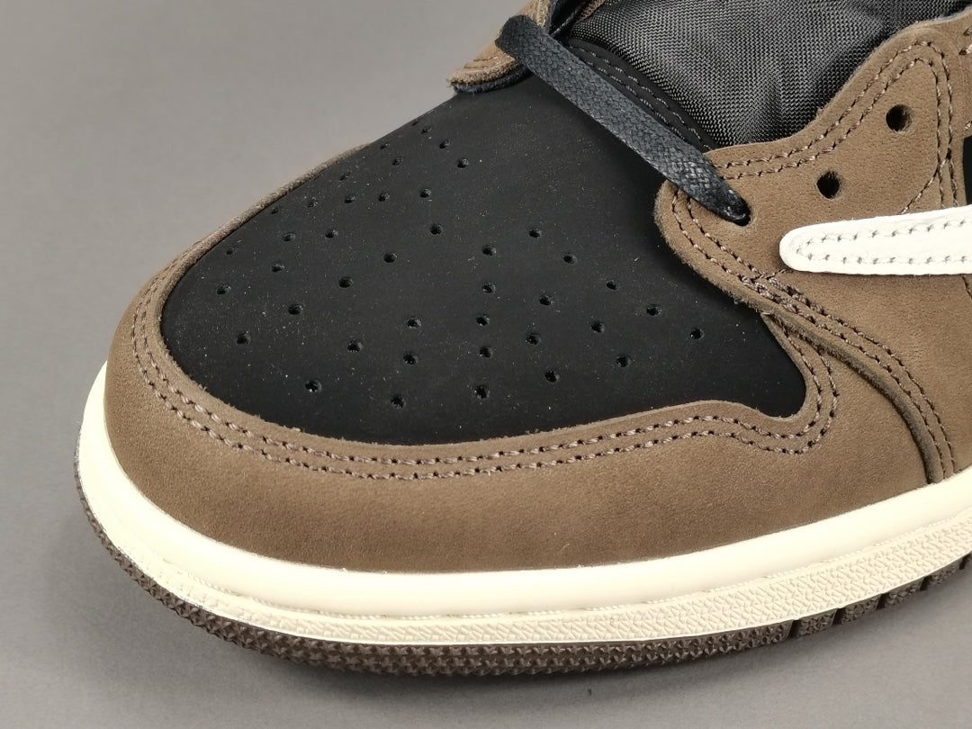 "Air Jordan 1 Low OG SP x Travis Scott sneakers featuring signature reverse Swoosh, premium materials, and Cactus Jack branding." 