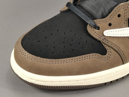 "Air Jordan 1 Low OG SP x Travis Scott sneakers featuring signature reverse Swoosh, premium materials, and Cactus Jack branding." 