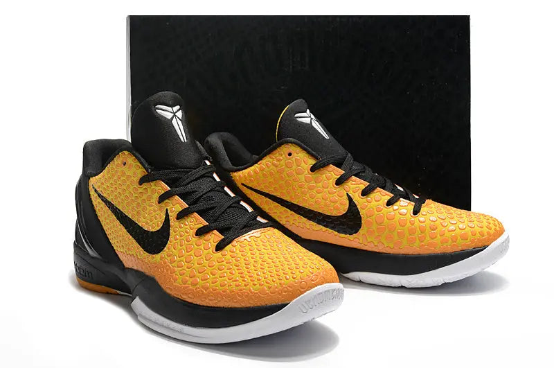 Nike Kobe 6 Protro Lightbulb edition sneakers in bright yellow with sleek low-top design.
