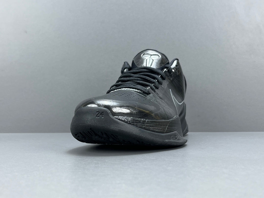 Nike Kobe 5 Blackout low-top basketball shoes in all-black stealth design colorway
