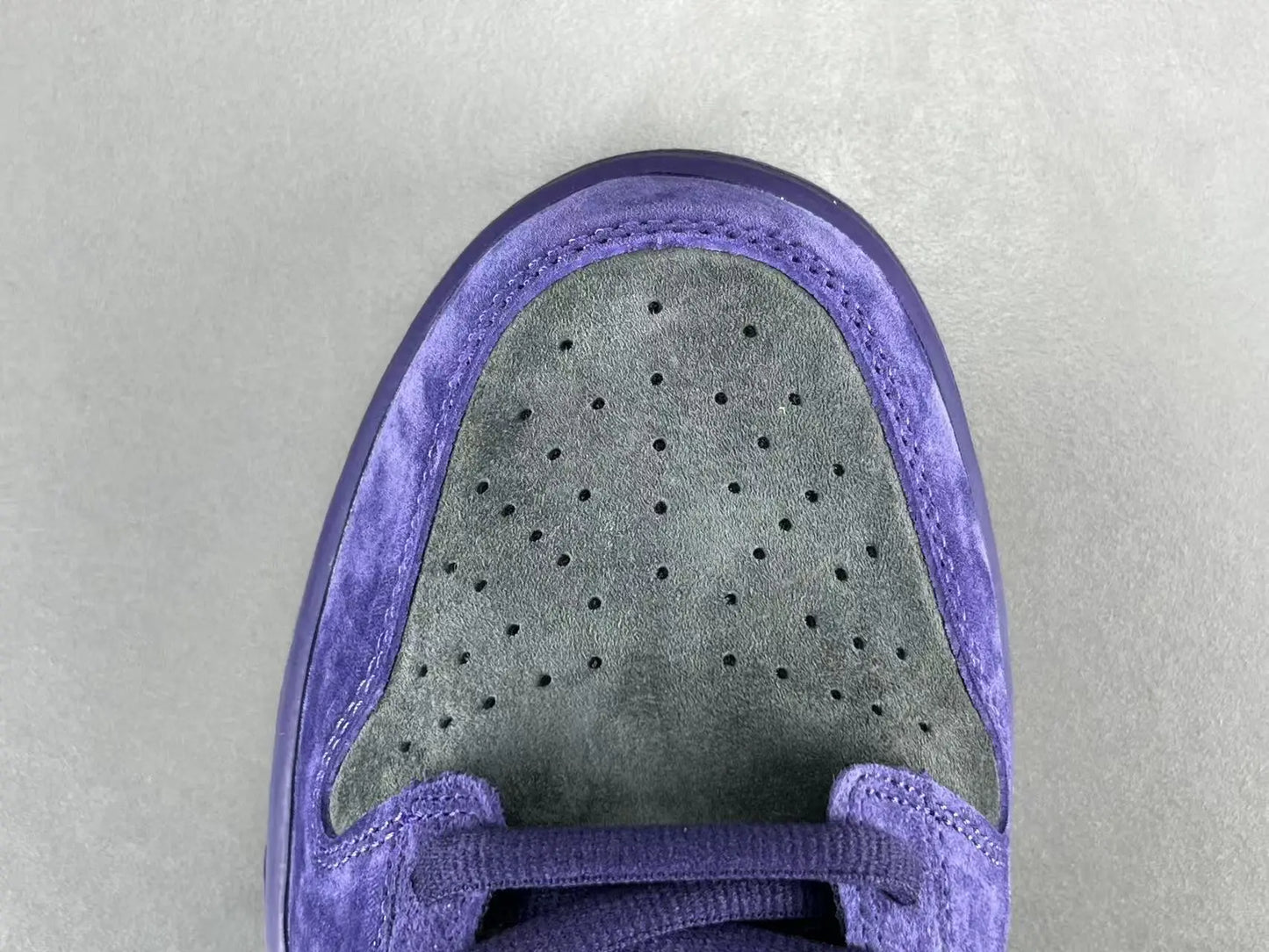 Nike SB Dunk Low x Supreme 94 Ink sneaker in deep blue leather
