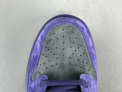 Nike SB Dunk Low x Supreme 94 Ink sneaker in deep blue leather
