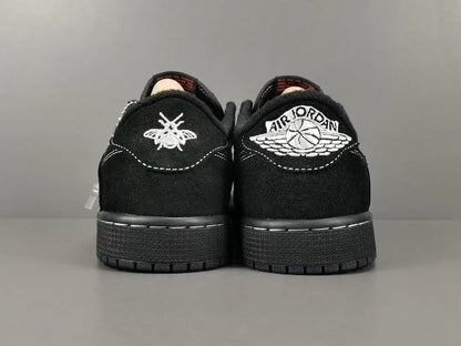 "Jordan 1 Low Travis Scott Phantom with black nubuck, white stitching, and signature reverse Swoosh."