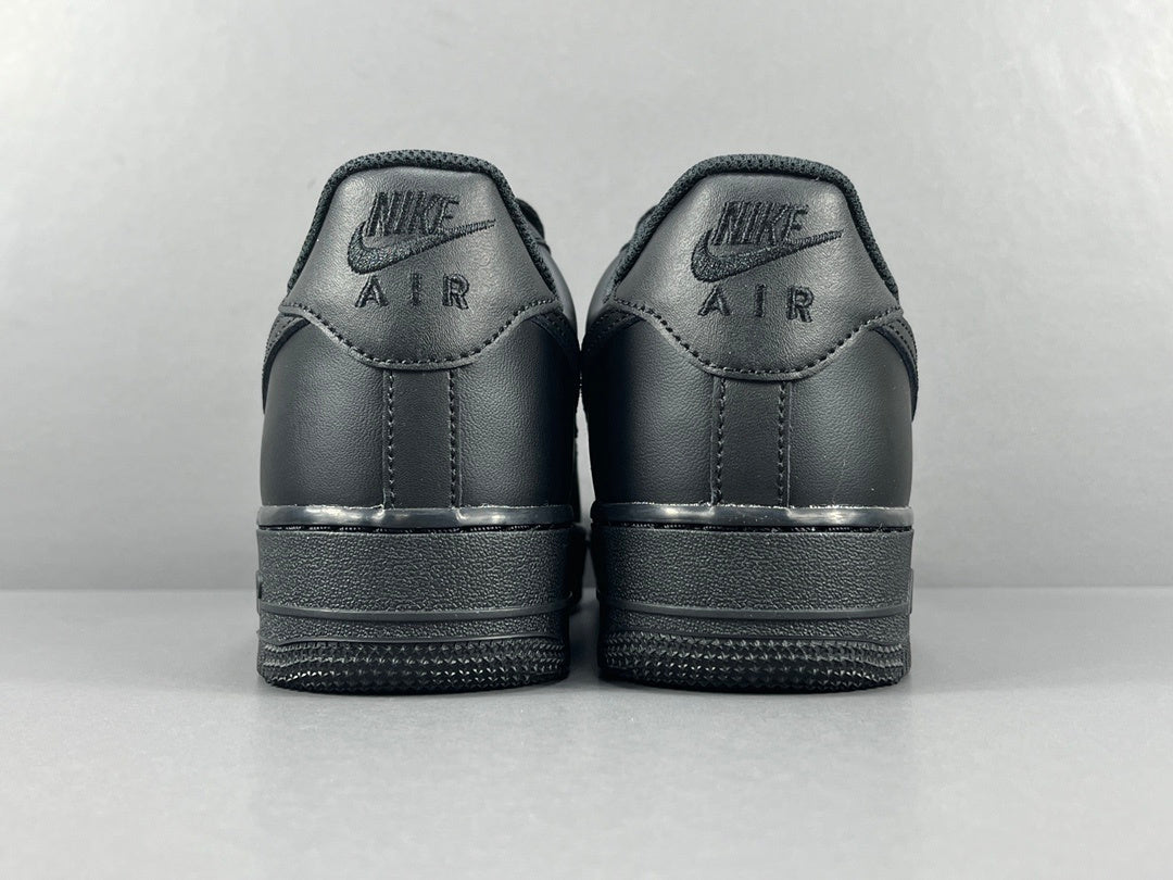 Nike Air Force 1 Black with classic silhouette, smooth leather upper, and all-black finish