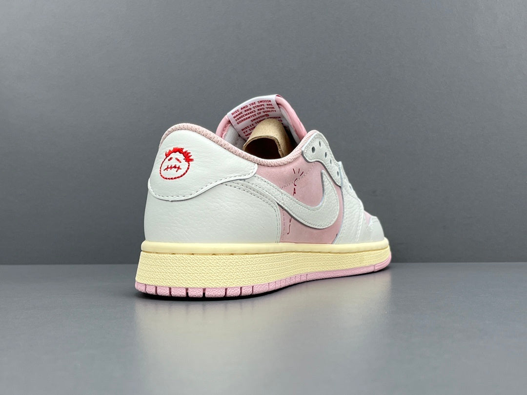 Jordan 1 Low x Travis Scott Shy Pink sneakers with reversed Swoosh design