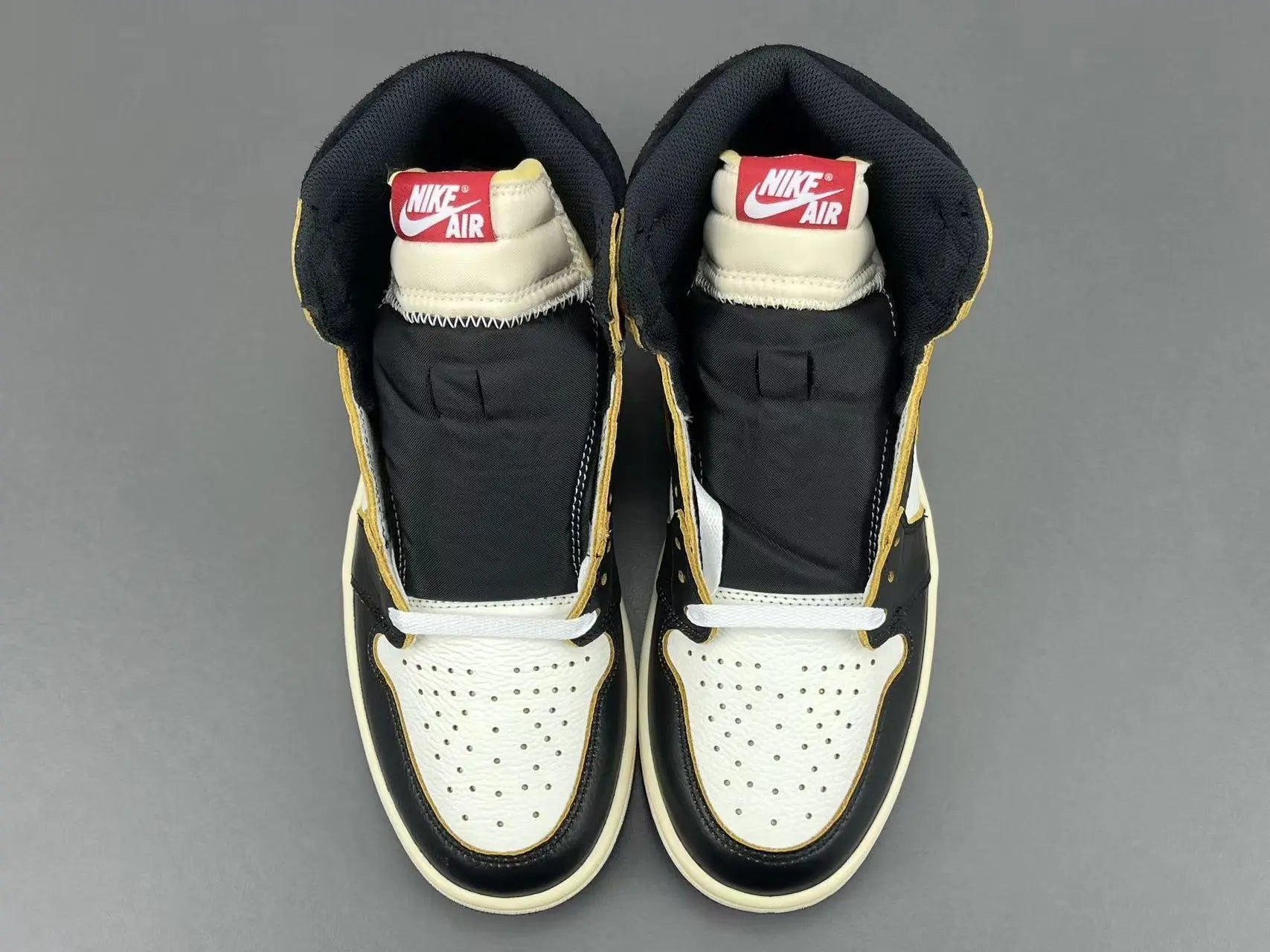 Air Jordan 1 High OG Fragment Union LA side view white navy leather sneaker