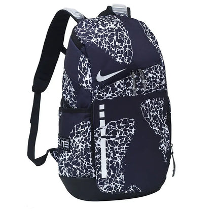 A Nike backpack in navy blue with a white abstract cracked pattern, featuring a white Nike swoosh on the front pocket.