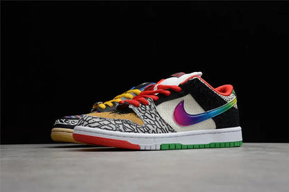 Nike SB Dunk Low What The Paul colorful patchwork upper with Nike Swoosh lateral view on white background