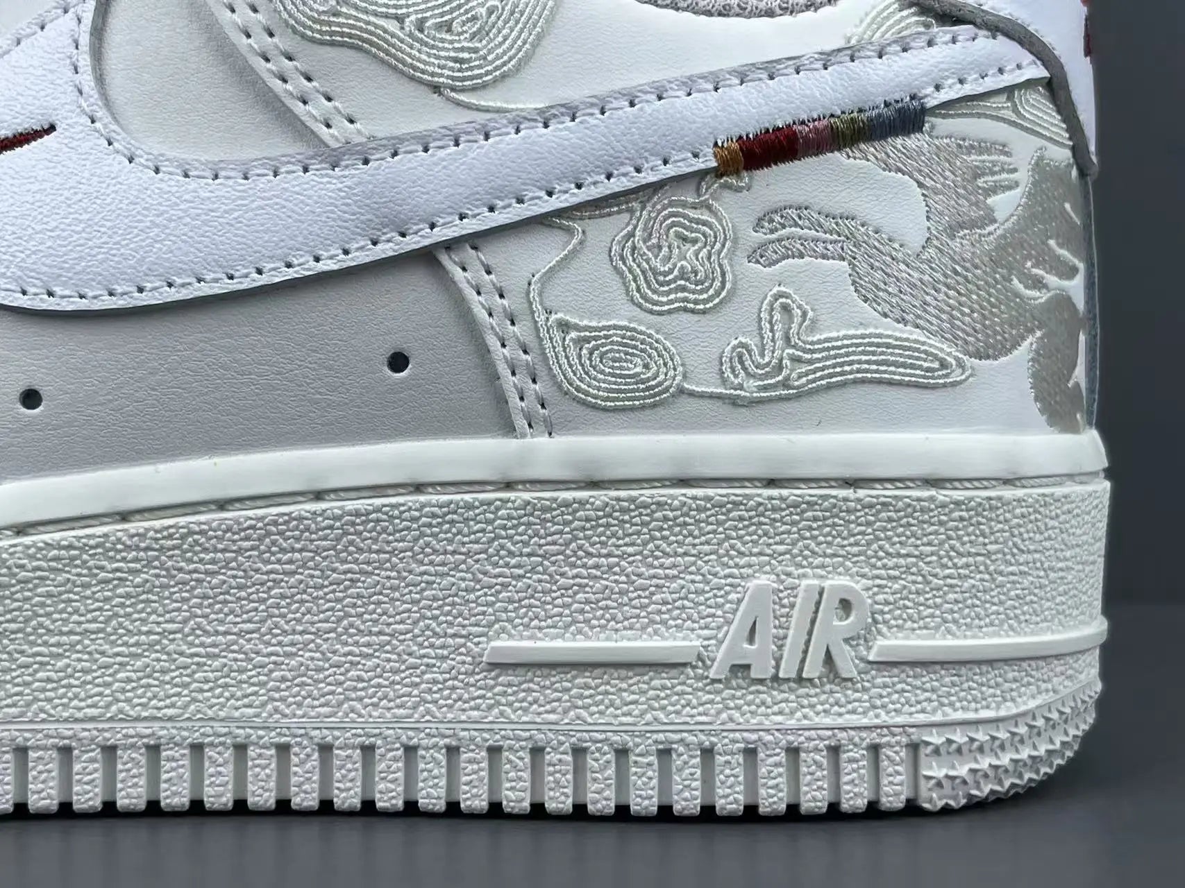 Nike Air Force 1 Pegasus Pack Phantom side view all-white leather sneaker