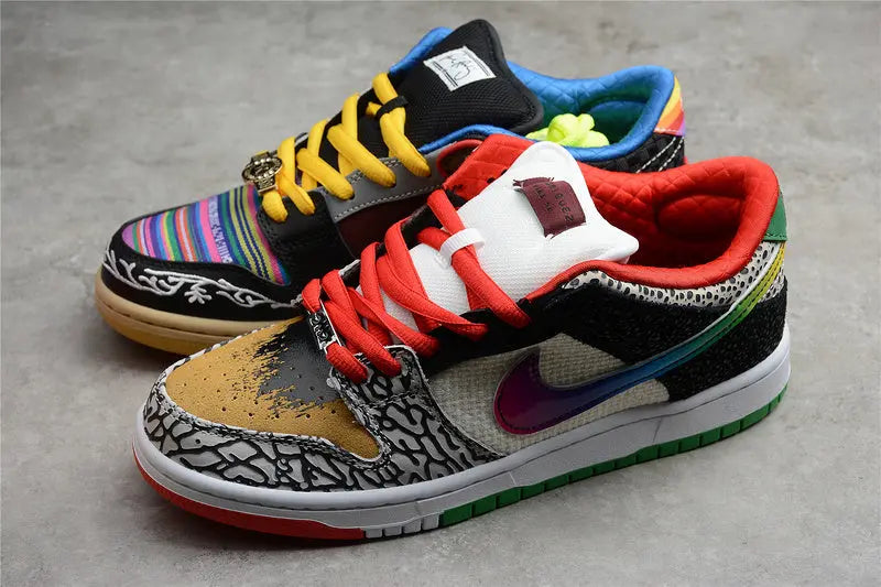 Nike SB Dunk Low What The Paul colorful patchwork upper with Nike Swoosh lateral view on white background